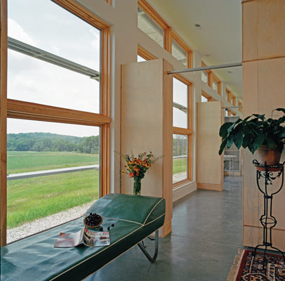 Beyond the kitchen, a hallway along the home’s south side leads to a core of rooms detached from the outside walls and the master bedroom at the east end of the house.